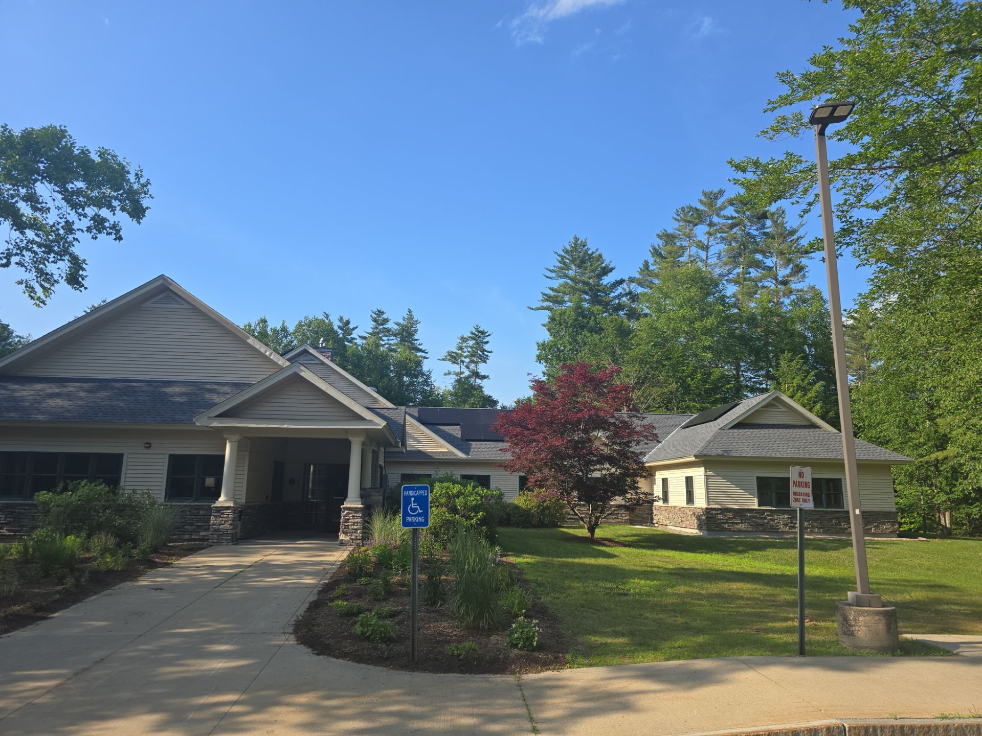 Rooftop commercial solar installation on a public library building completed by Porter Electrical Contracting.