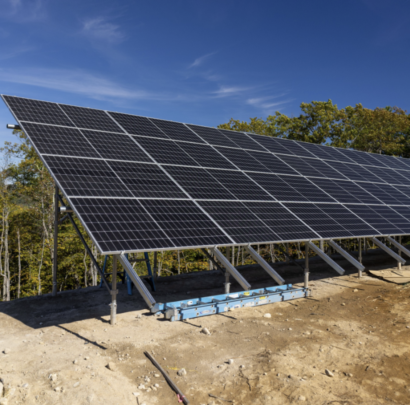 Ground-mounted commercial solar in Candia, NH featuring high-efficiency solar panels installed by Porter Electrical Contracting.